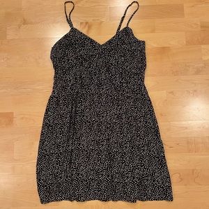 Black and White Polka Dot Mini Dress with spaghetti straps and cinched waist